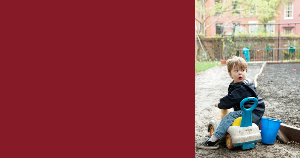young boy on toy car - family and child photographer hollywood